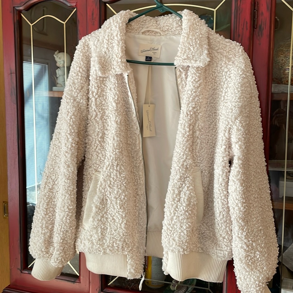Cream color jacket. Brand new - never worn